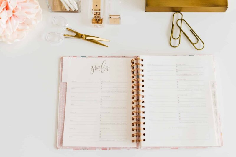 A planner on a white table